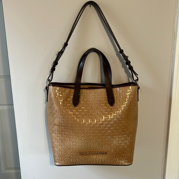 Dooney & Bourke tan basket weave leather tote bag.